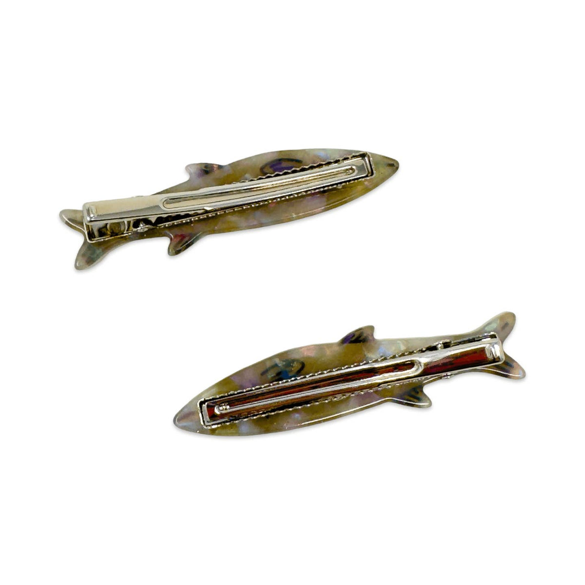 Two shark-shaped tie clips on a white background