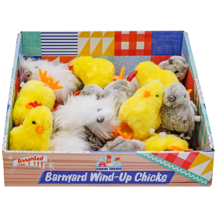 Box of assorted barnyard wind-up chicks with colorful packaging.