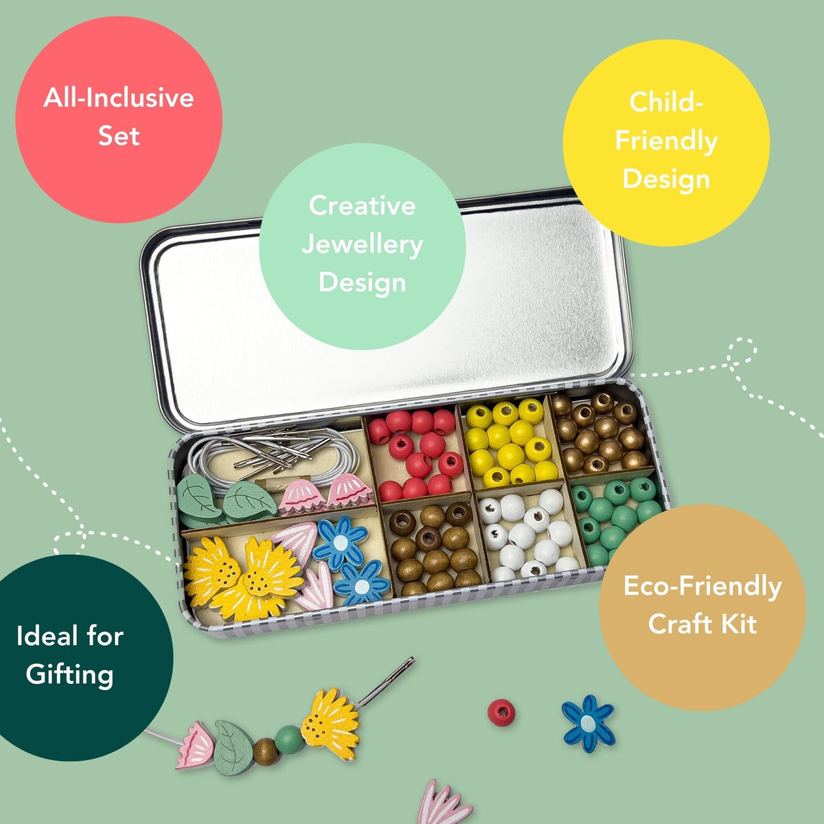 Children's jewelry making kit with colorful beads and tools on a green background