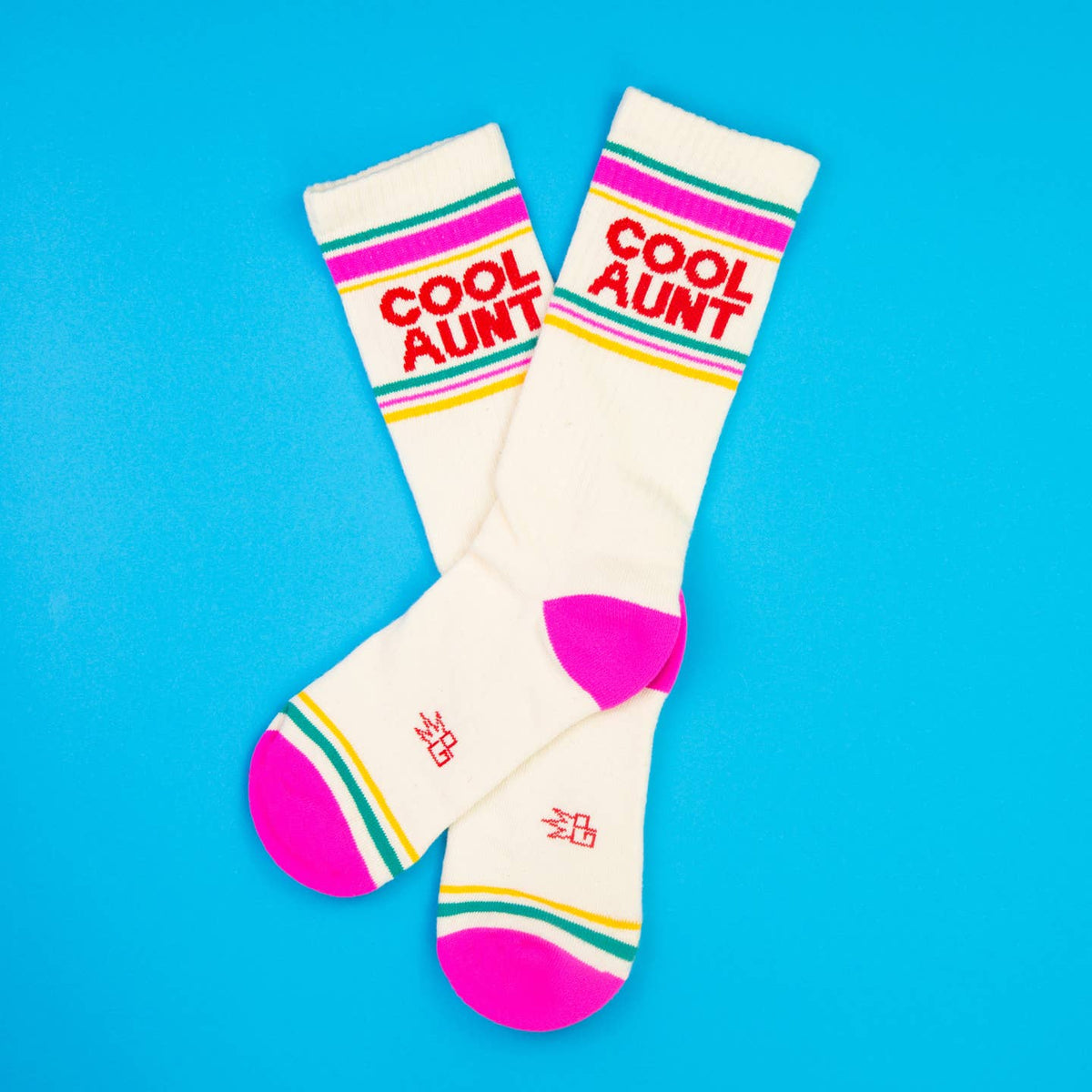 White socks with colorful text and accents on a blue background