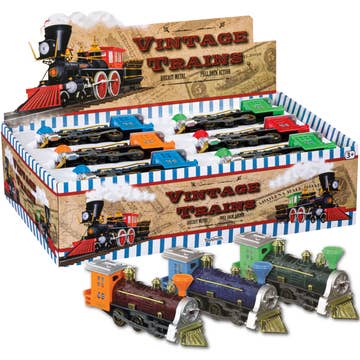 Display box of vintage toy trains with a variety of models.