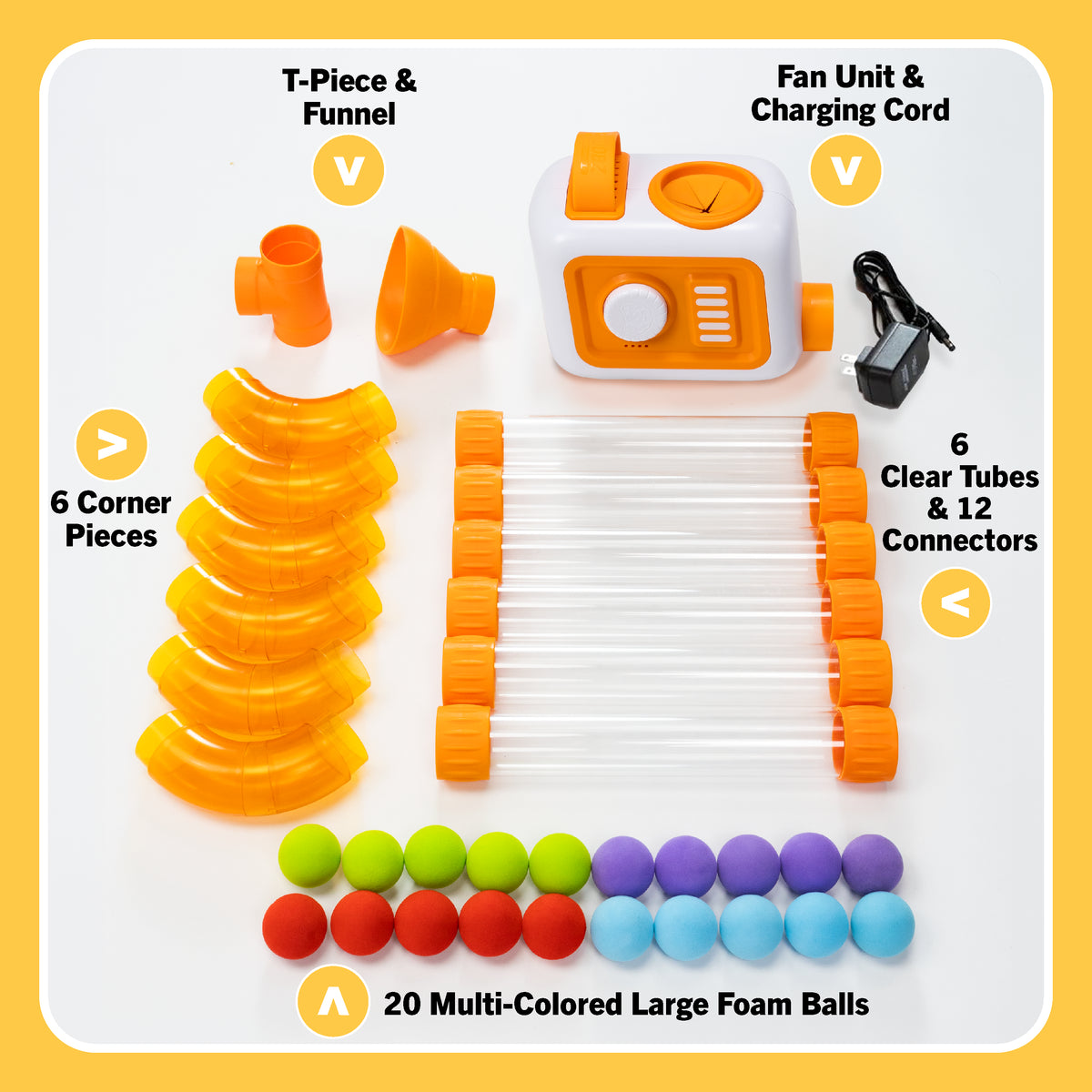 A toy playset laid out on a white background with a yellow border. The set includes an orange and white fan unit with a charging cord, clear plastic tubes, orange corner pieces, a funnel, T-pieces, and 20 multi-colored foam balls in green, red, orange, yellow, blue, and purple.