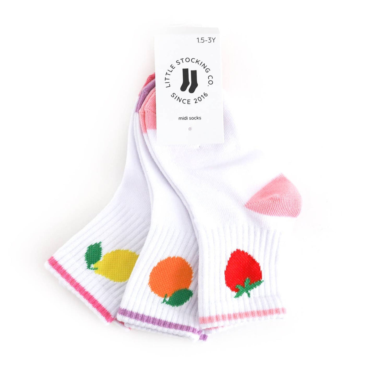 Pair of socks with fruit designs on a white background, featuring the brand 'Little Stocking Co'.
