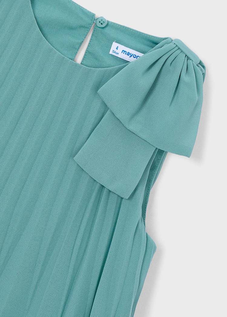 Teal dress with ruffled sleeves on a white background