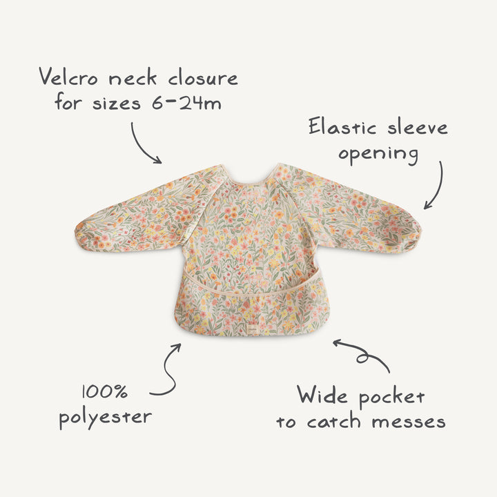 Floral-patterned bib with features labeled on a white background