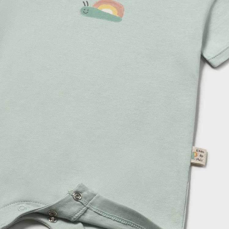 Light green baby romper with embroidered design on a white background