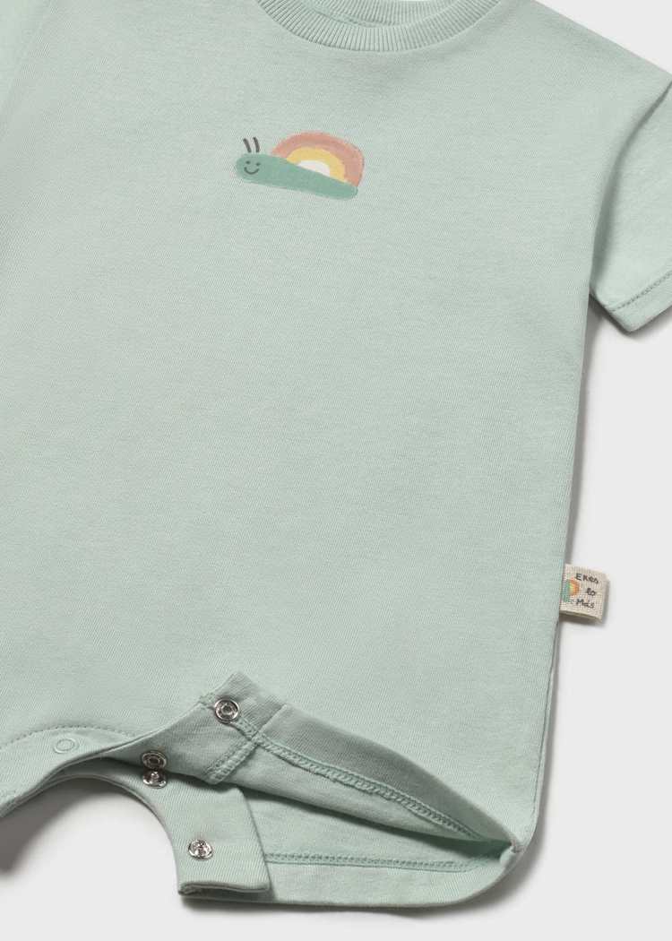 Light green baby romper with embroidered design on a white background