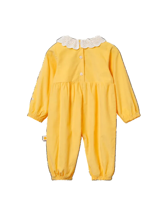 A yellow long-sleeve baby jumpsuit with a white lace collar and snap buttons, shown against a plain white background.