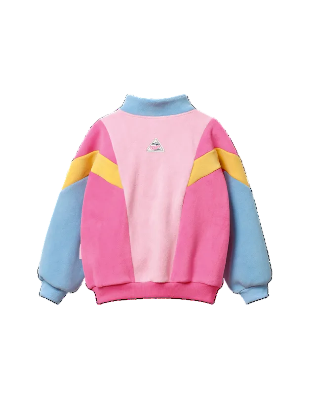 A children's colorblock fleece sweatshirt shown from the back, featuring a pink center panel, light blue sleeves and collar, yellow chevron stripes, and a small cartoon graphic on the upper back.