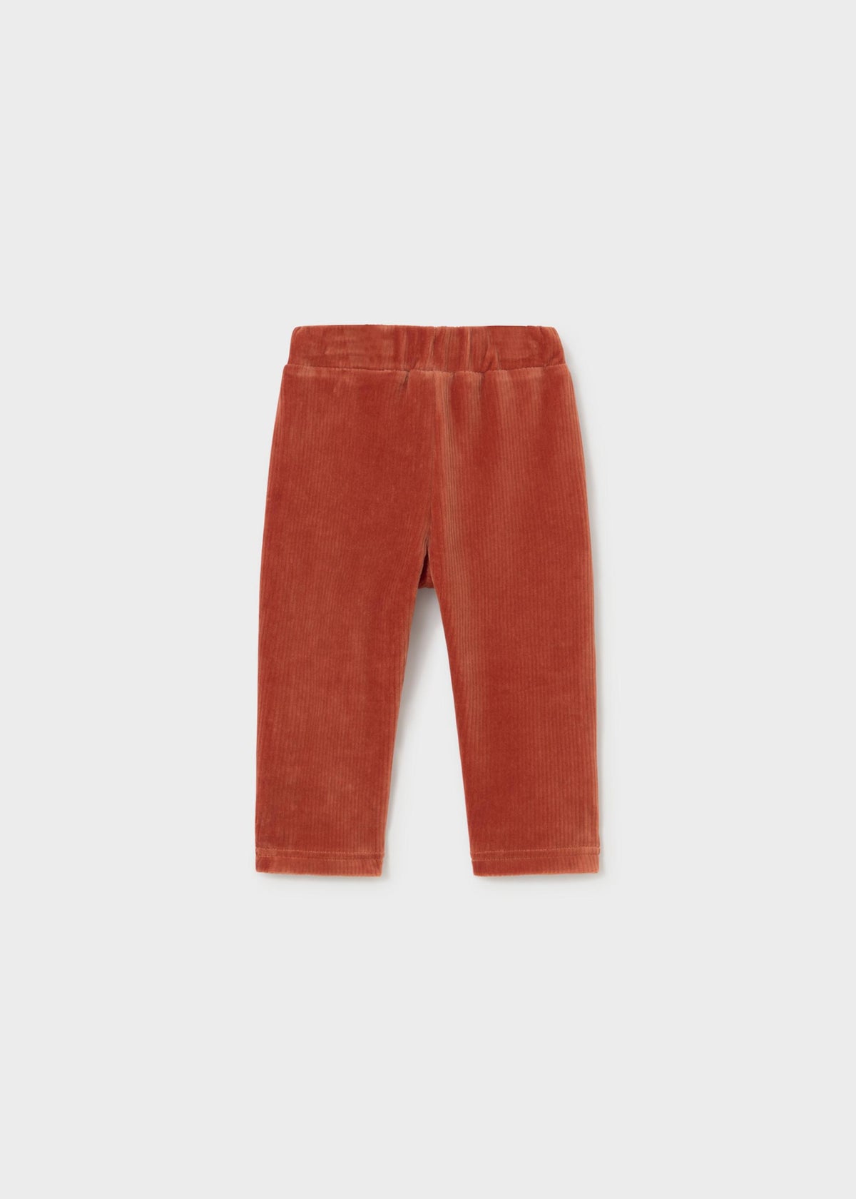 A pair of Mayoral baby corduroy jogger trousers in a terracotta/teja orange color with a soft textured finish.