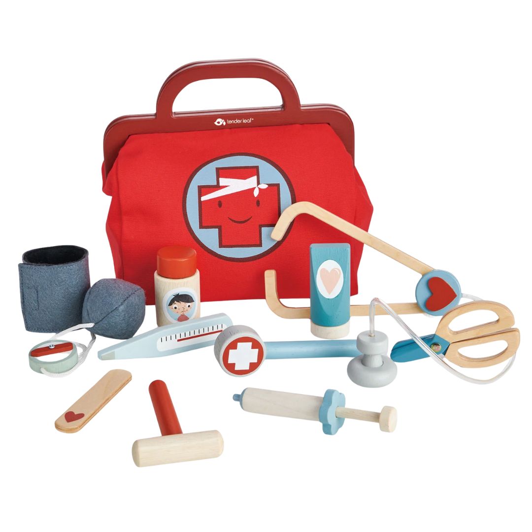 Toy medical kit with red bag, various tools, and containers on a white background