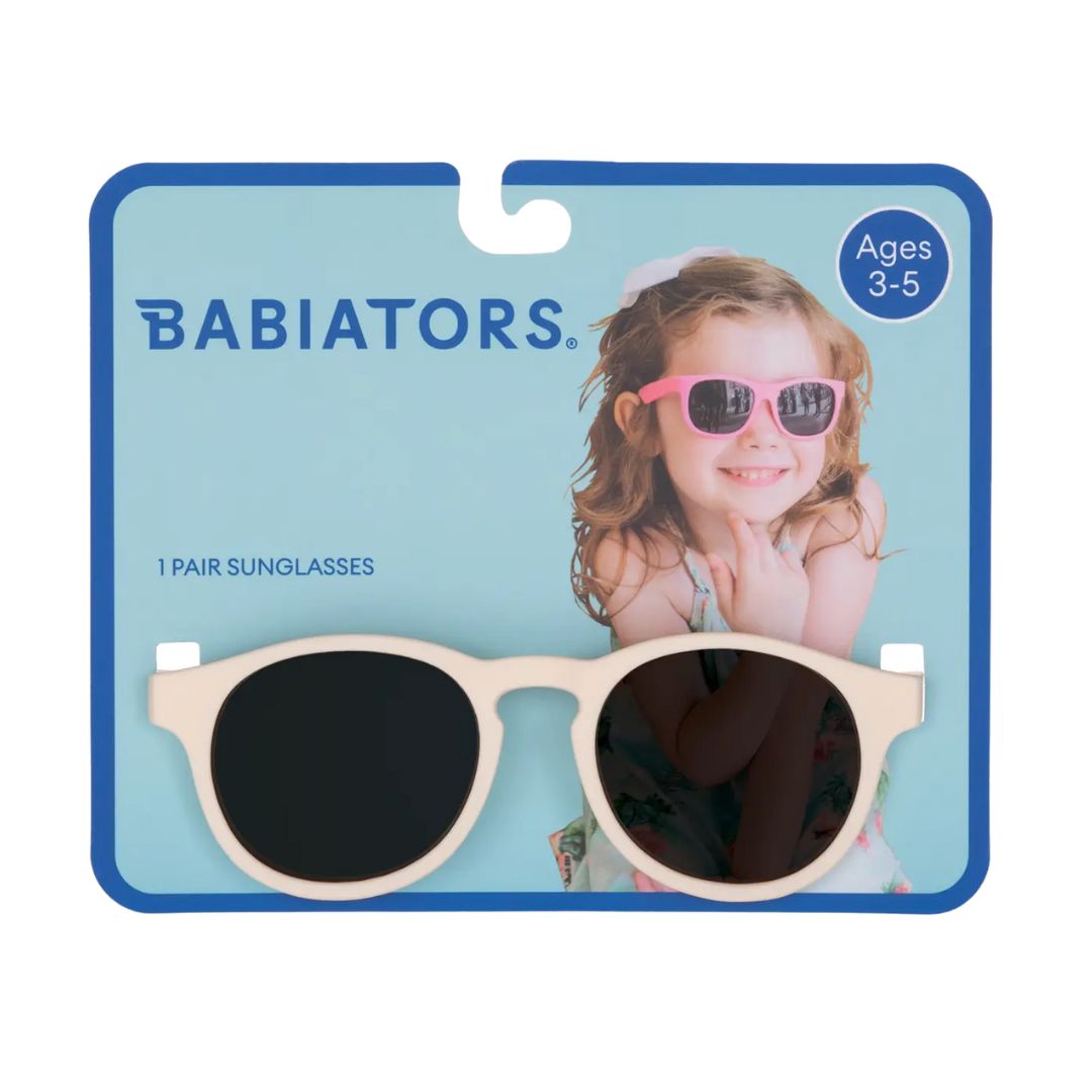 Babiators sunglasses packaging with a child model and product display