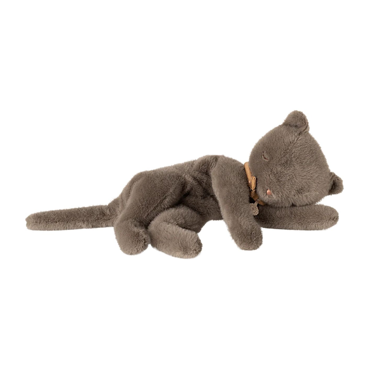 A gray plush cat toy lying down, wearing a tan collar with a small bell, isolated on a white background.