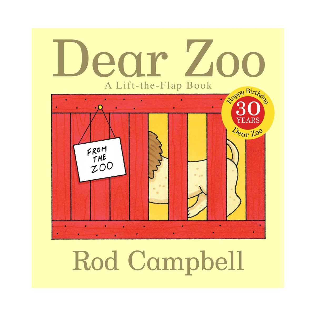 Front cover of the children's book 'Dear Zoo' by Rod Campbell, featuring a pale yellow background, a red zoo enclosure with a lion peeking out, and a yellow 'Happy Birthday 30 Years Dear Zoo' sticker.