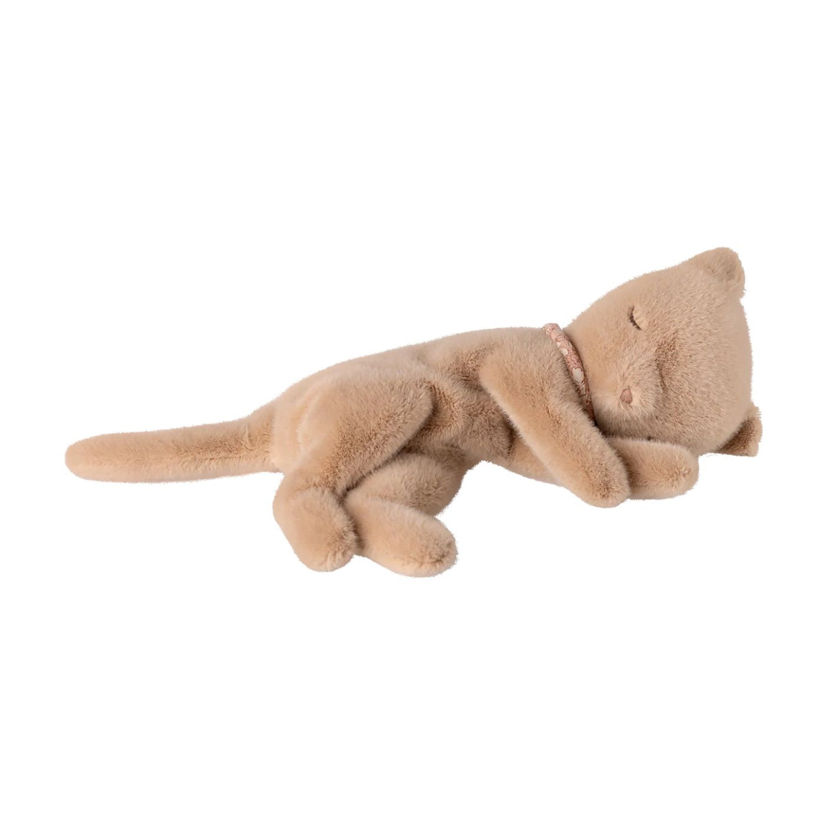 A sleeping beige plush cat toy with a small pink collar, lying on its side against a plain white background.