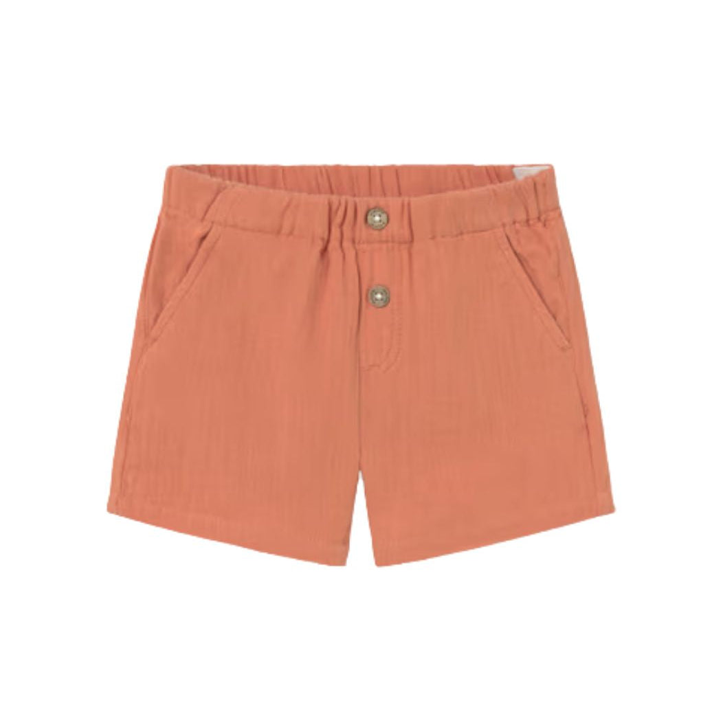 Orange shorts with button details on a white background