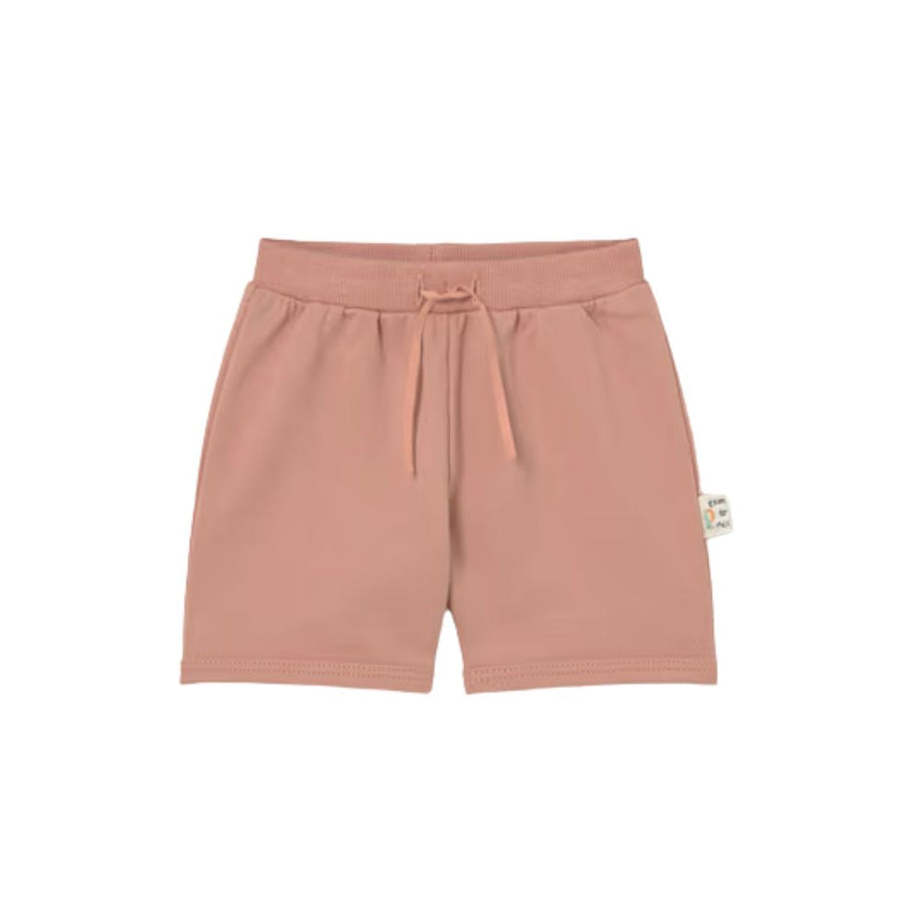 Pink shorts with a drawstring on a white background