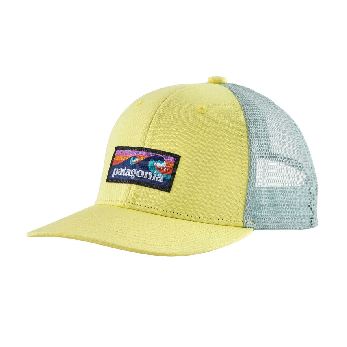 A yellow and light blue mesh-back trucker hat with a Patagonia logo patch on the front, shown against a plain white background.