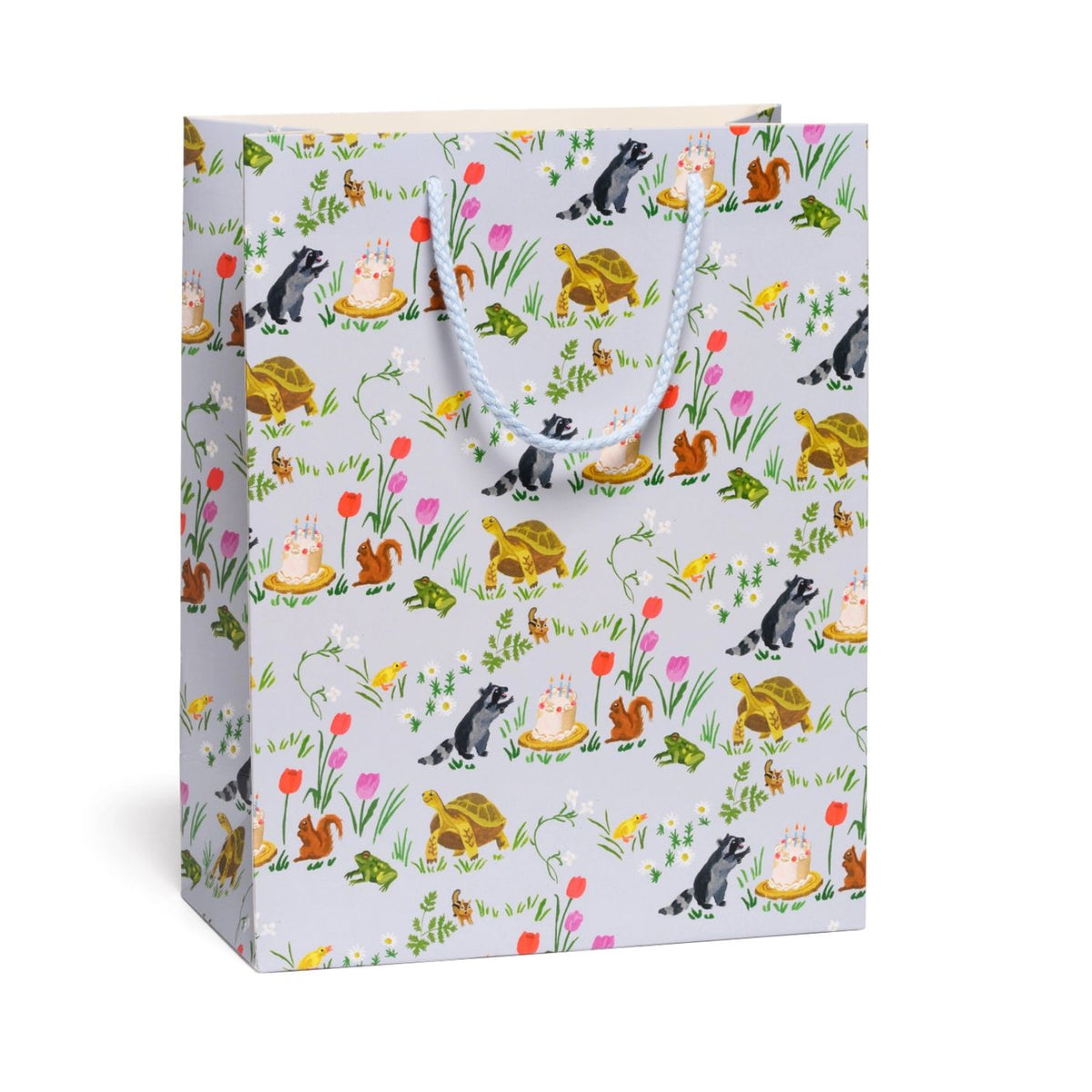 Gift bag with animal and nature pattern on a white background