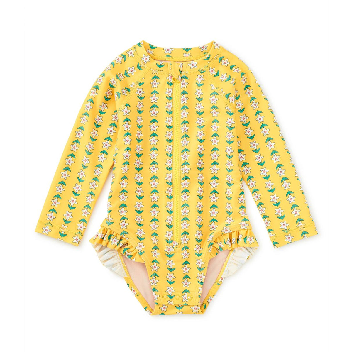 A yellow long-sleeve baby swimsuit or bodysuit with an all-over repeating floral print, featuring a ruffled neckline and leg openings, laid flat on a white background.