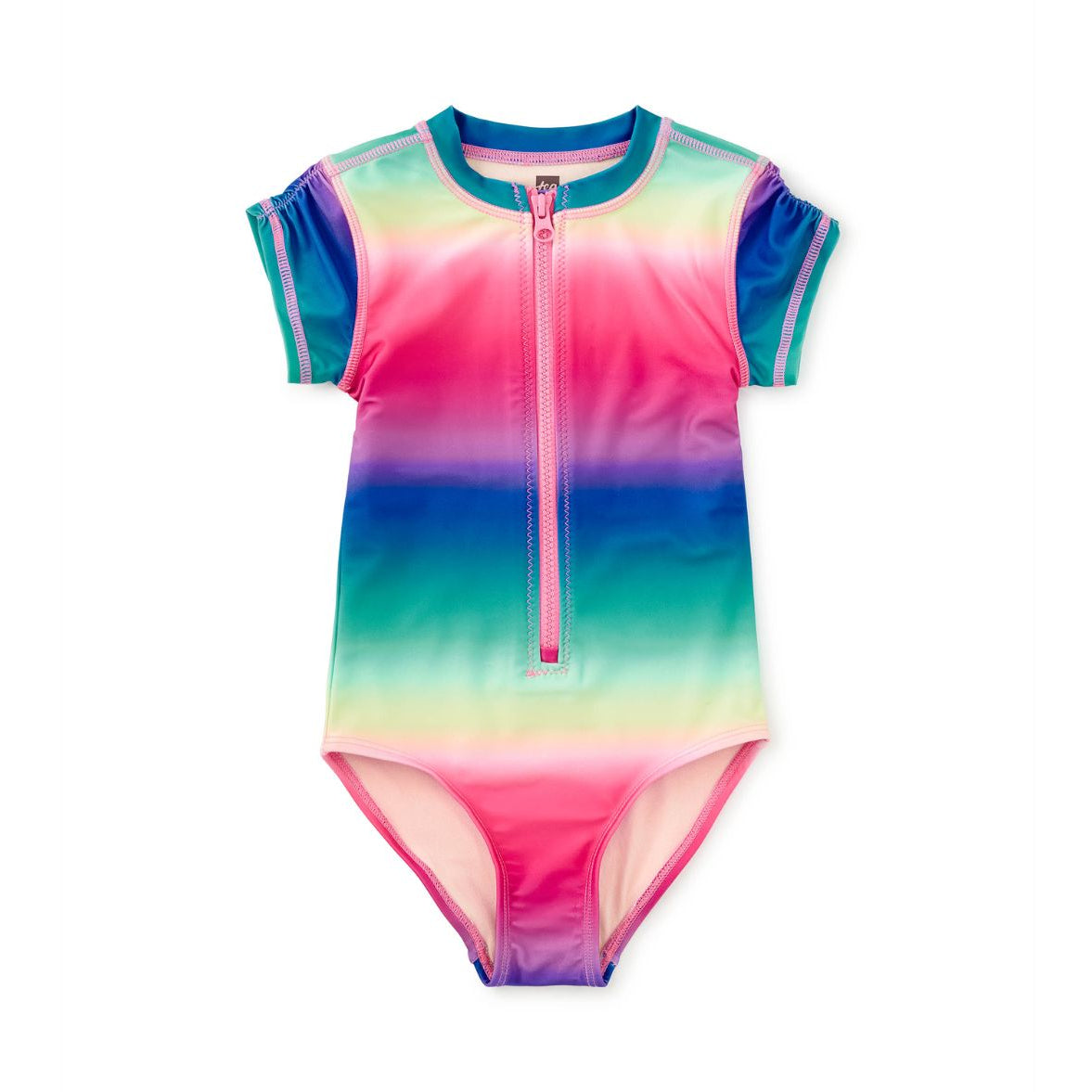 A short-sleeve one-piece swimsuit with a colorful gradient design transitioning from pink at the top, through purple and blue, to green and pale yellow at the bottom. It features a front zipper and a crew neckline, shown flat on a white background.