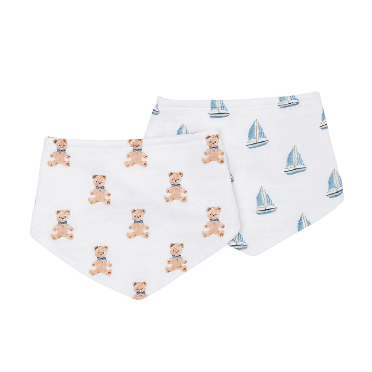 Two baby bibs with teddy bear and sailboat patterns on a white background