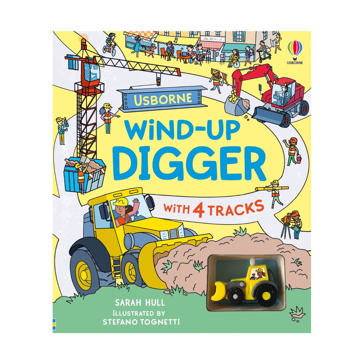Usborne Wind-Up Digger children's activity book cover, featuring a colorful cartoon construction scene with a wind-up toy digger visible in a clear window on the lower right.