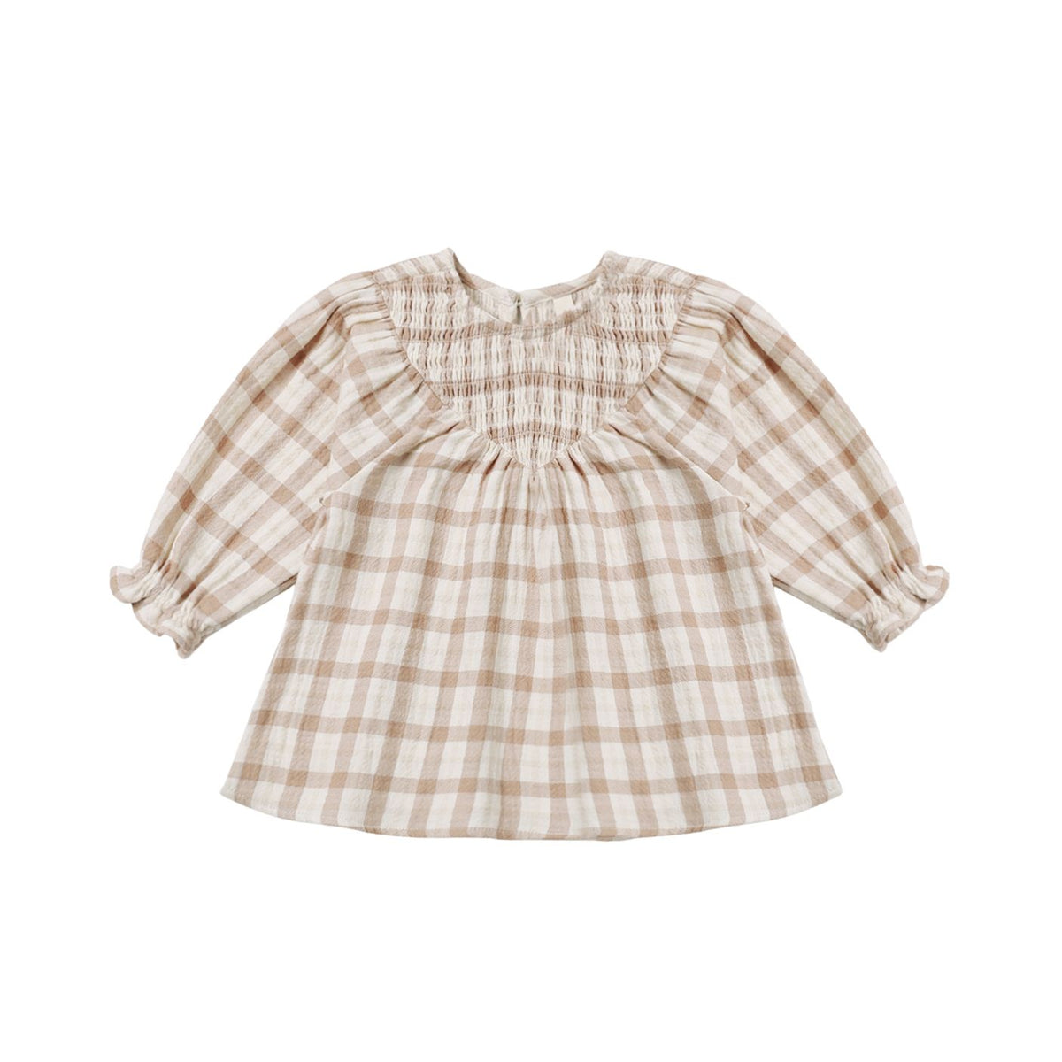 A toddler girl's long-sleeve smocked blouse in a beige and white gingham pattern, featuring a ruffled smocked neckline and gathered sleeves.