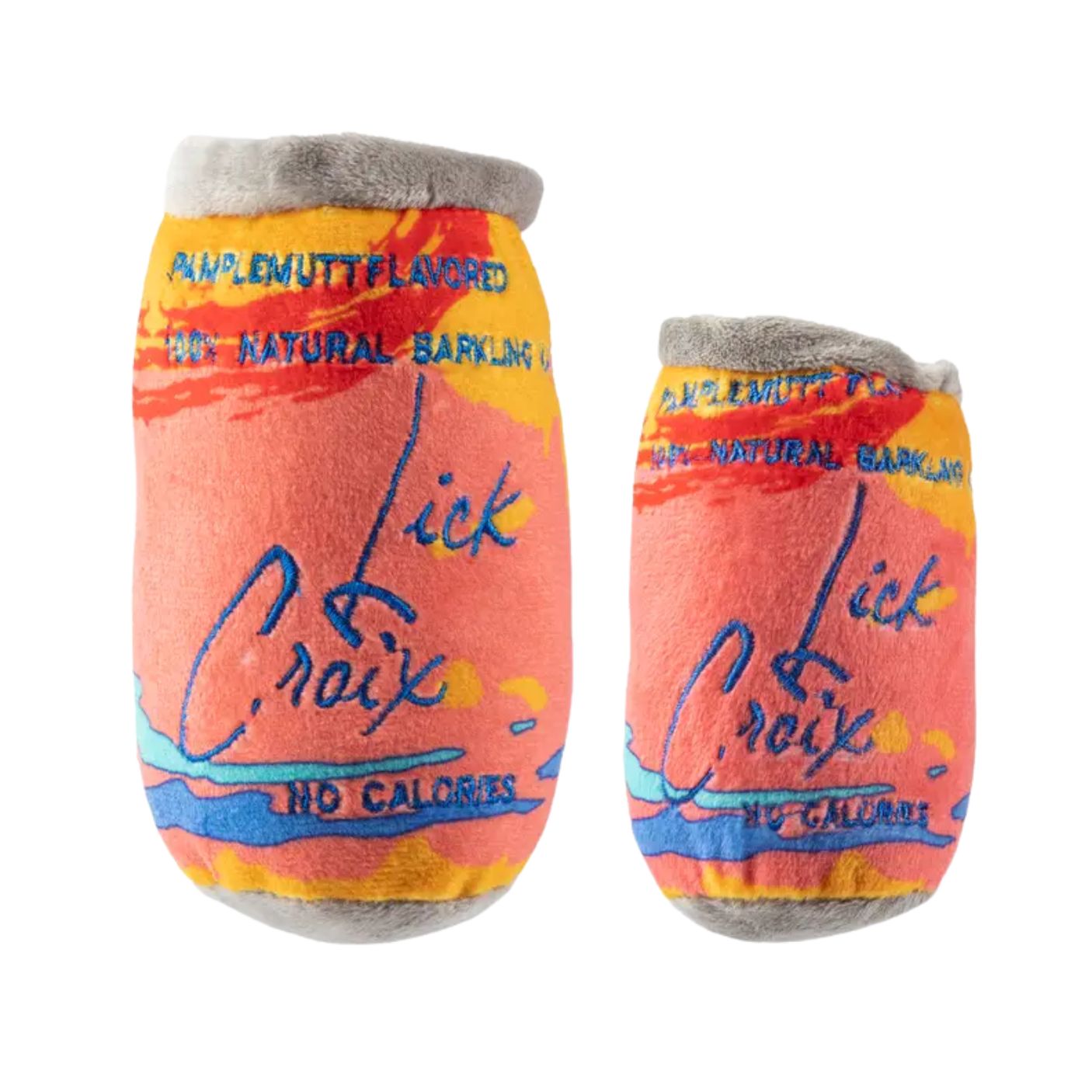 Two plush novelty slippers shaped like Lick Croix energy drink cans, shown on a plain white background. The slippers feature a peach-pink body with orange, yellow, and blue graphic details, gray faux-fur trim at the top and bottom, and printed text including 'Lick Croix' and 'No Calories'.