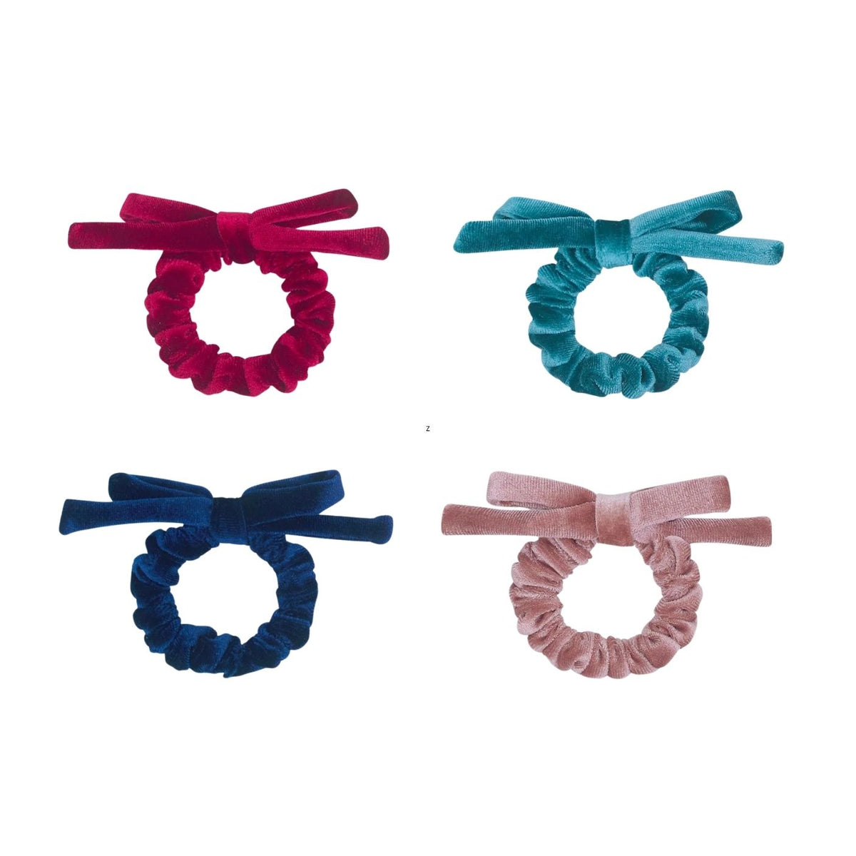 Four velvet scrunchies with bows in red, blue, pink, and navy on a white background.