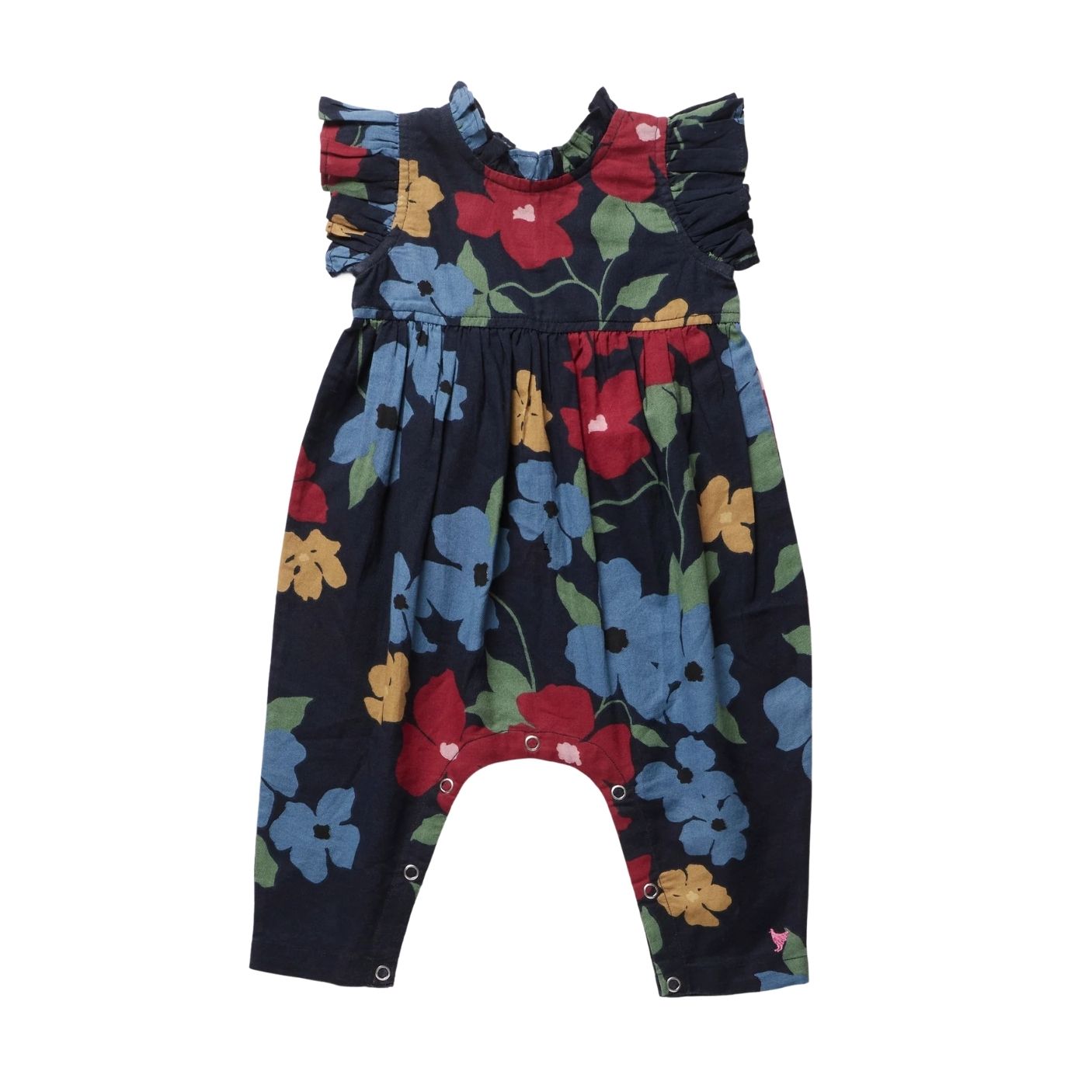 A baby romper with a dark navy blue background and a colorful floral print featuring red, blue, yellow, and green flowers, shown against a plain white background.