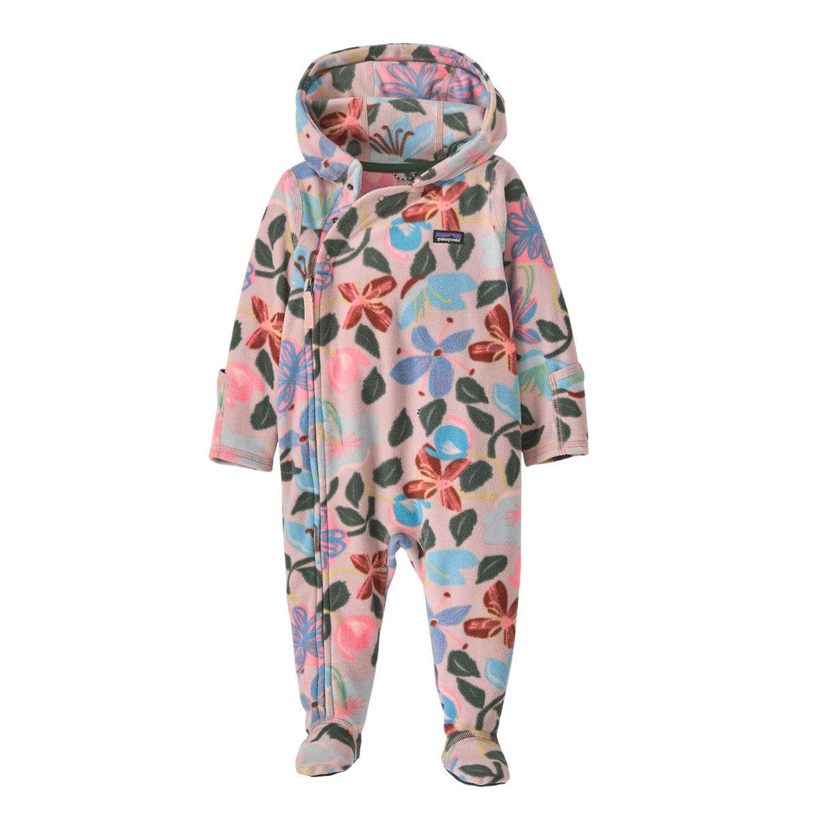 A baby's footed hooded one-piece jumpsuit in a pastel pink floral print, featuring a front zipper and a small Patagonia logo patch on the chest.