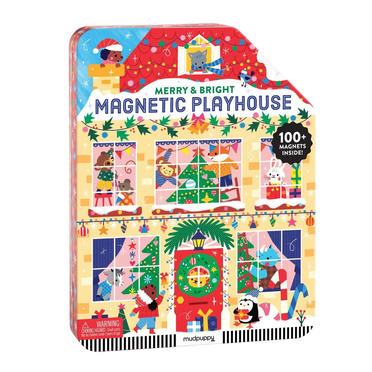 A product photo of the Merry & Bright Magnetic Playhouse by Mudpuppy in a colorful hinged tin box. The front cover features a festive holiday house scene filled with holiday decorations, windows showing characters like Santa and a snowman, and a "100+ Magnets Inside!" badge against a white background.