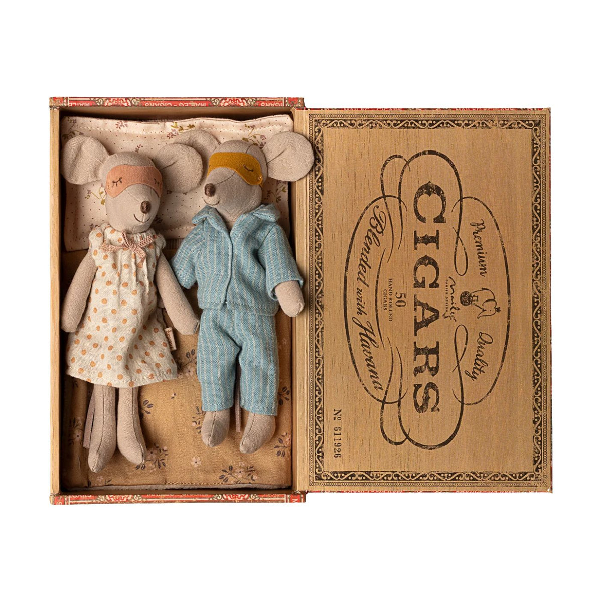 Maileg Mum and Dad Mice in a vintage cigar box bed, dressed in cozy pyjamas with eye masks and resting on a floral mattress and blanket.