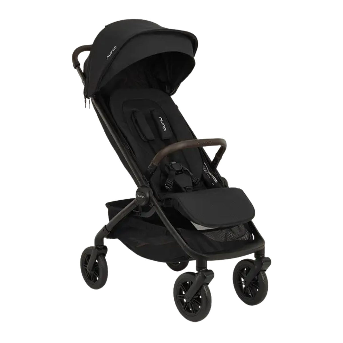 Nuna TRVL 360 lightweight travel stroller in Caviar black, shown in a three-quarters front view against a clean white background. The stroller features an extended sun canopy, a brown leatherette-accented pushbar and rotating armbar, a harness with a magnetic buckle, 360-degree swivel wheels, and an under-seat storage basket.