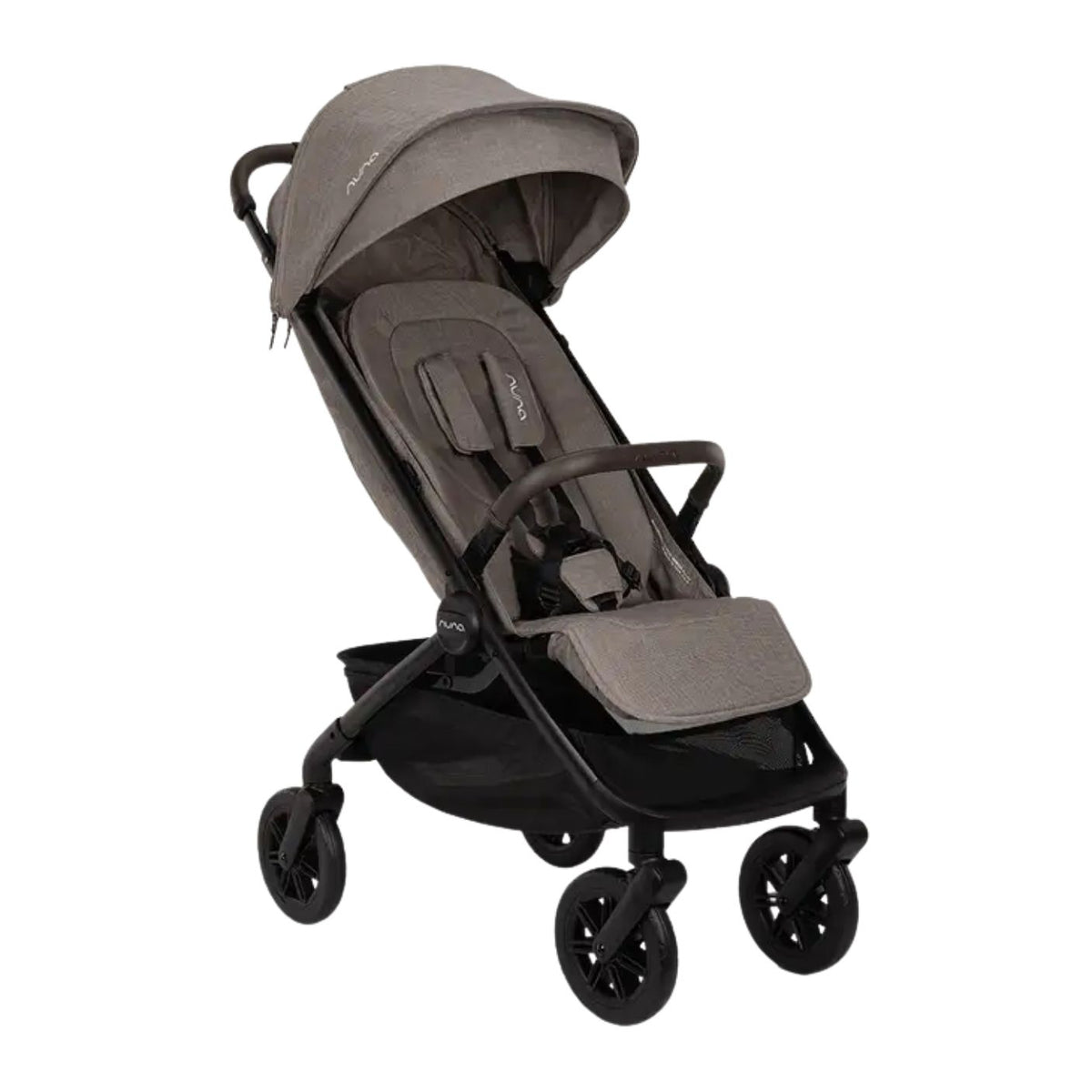 Nuna TRVL 360 lightweight travel stroller in Cedar brown, shown in a three-quarters front view against a clean white background. The stroller features an extended sun canopy, a brown leatherette-accented pushbar and rotating armbar, a harness with a magnetic buckle, 360-degree swivel wheels, and an under-seat storage basket.