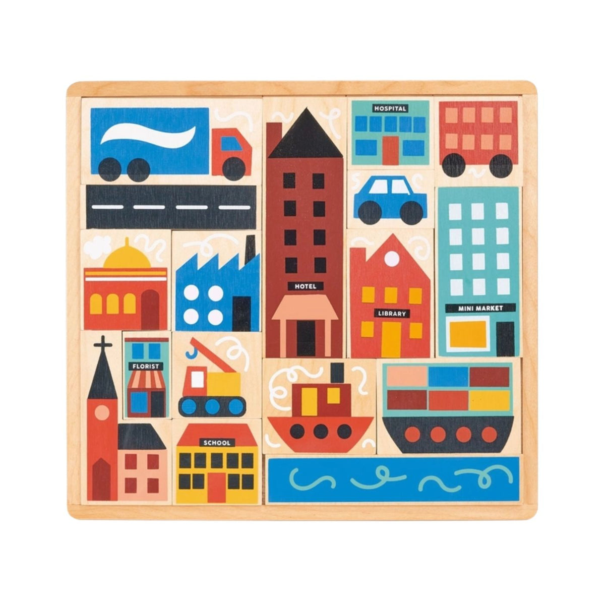 A top-down view of the Mentari Wooden Town Puzzle featuring a square wooden tray filled with 17 colorful, removable wooden pieces that form a charming town scene. The illustration includes various buildings such as a blue and red delivery truck, a red hospital, a yellow florist shop, a school, a brown hotel, a red library, a mini market, a church with a cross, a blue car, a red boat on blue waves, and other urban elements in shades of blue, red, yellow, orange, and teal.