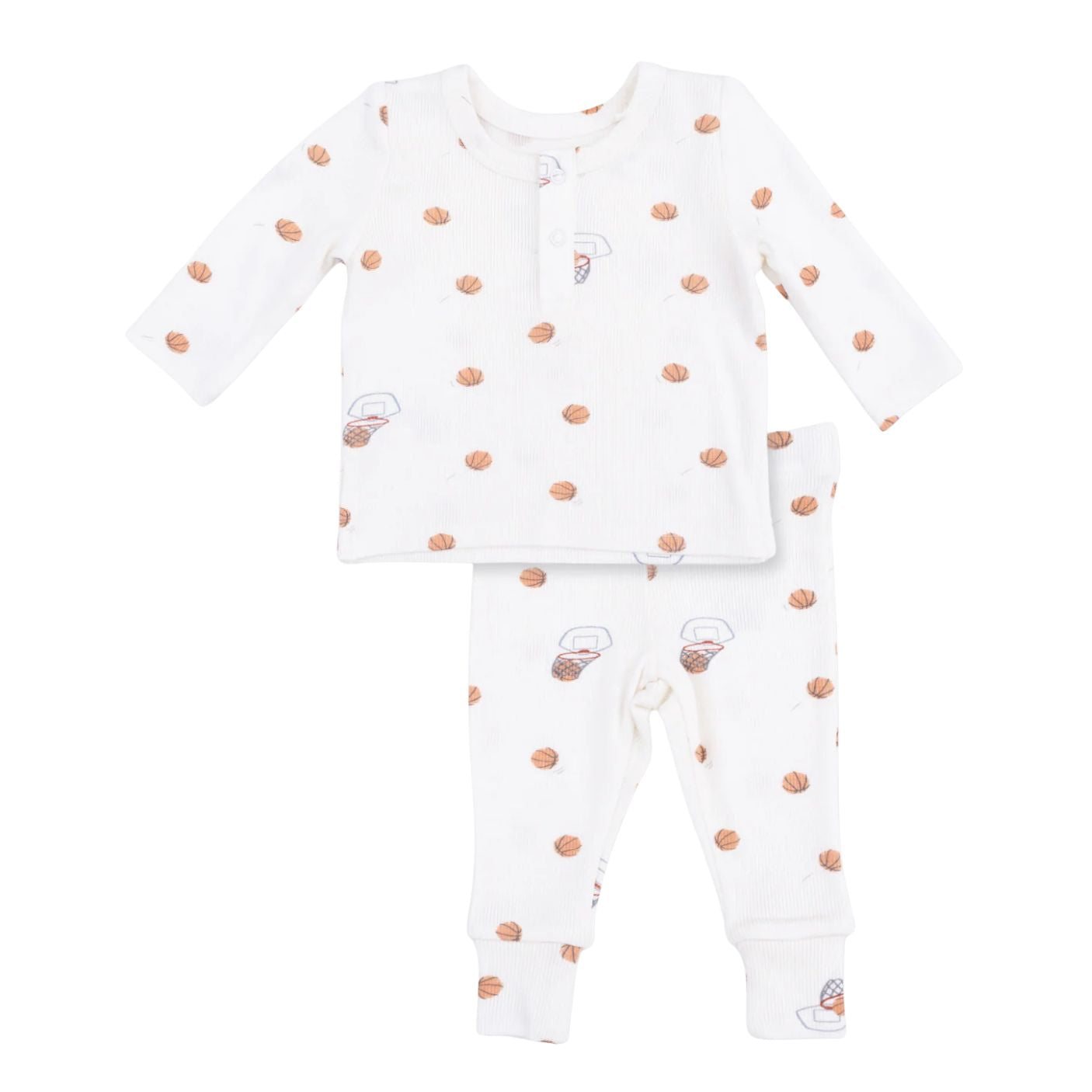A baby two-piece pajama set featuring a long-sleeve top and matching pants in white, decorated with small brown teddy bear illustrations and scattered brown polka dots.