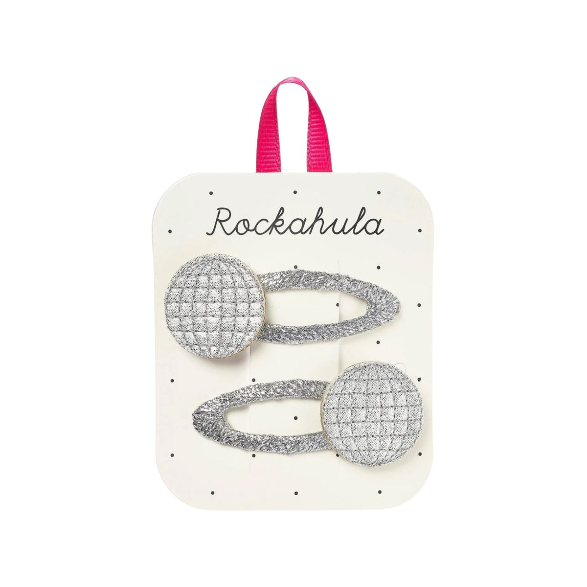 Silver hair clips on a Rockahula branded card with a pink ribbon.