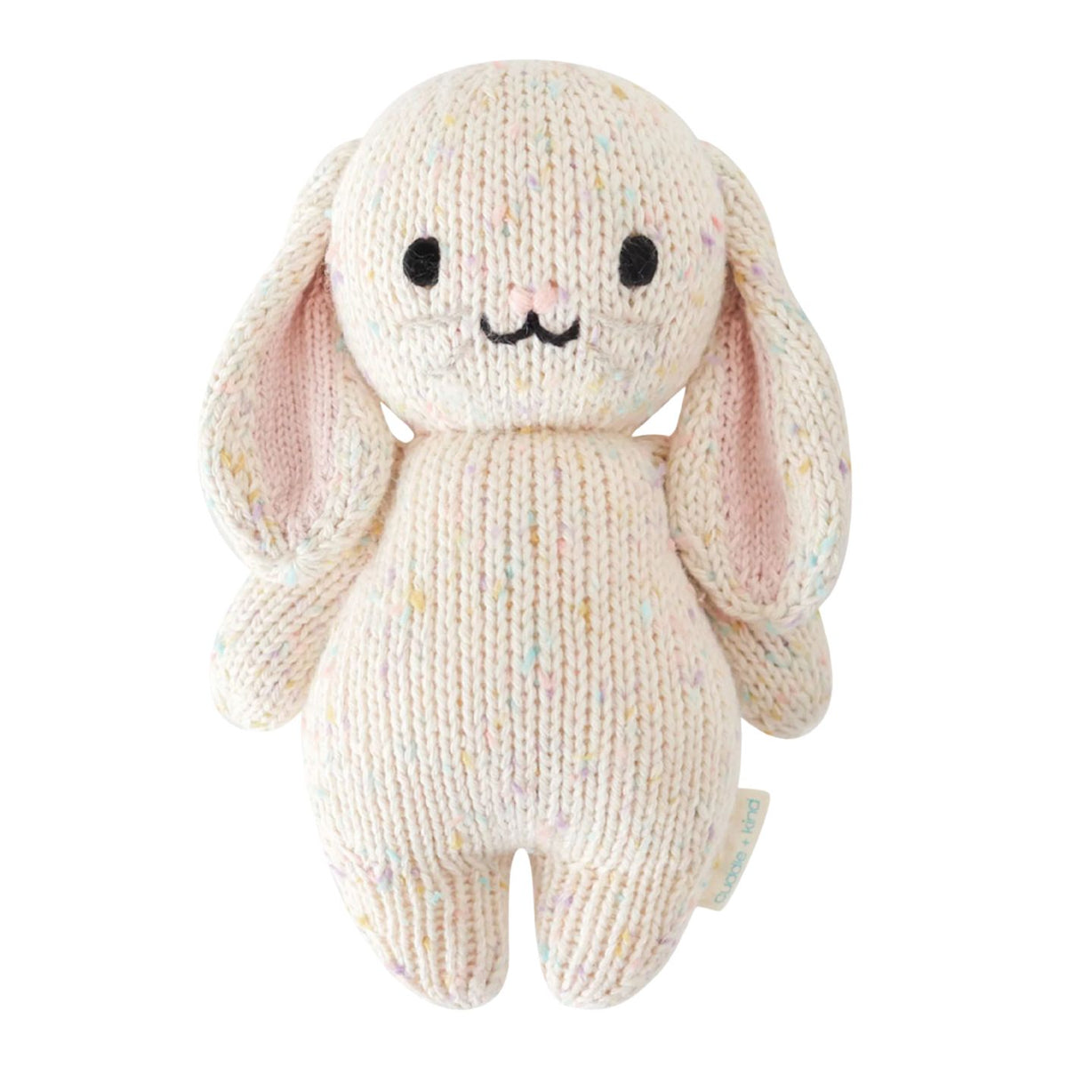 Knitted bunny toy with pink ears on a white background