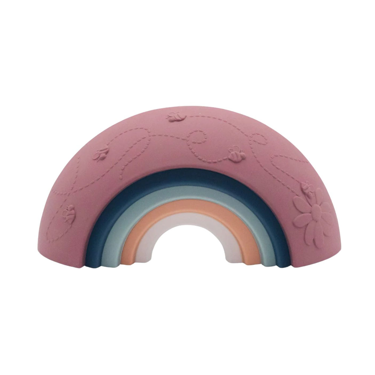 A pastel rainbow-shaped silicone baby teether or sensory toy on a solid white background. The toy features a dusty pink top layer with embossed floral and leaf patterns, layered over rainbow stripes of blue, teal, peach, and white.
