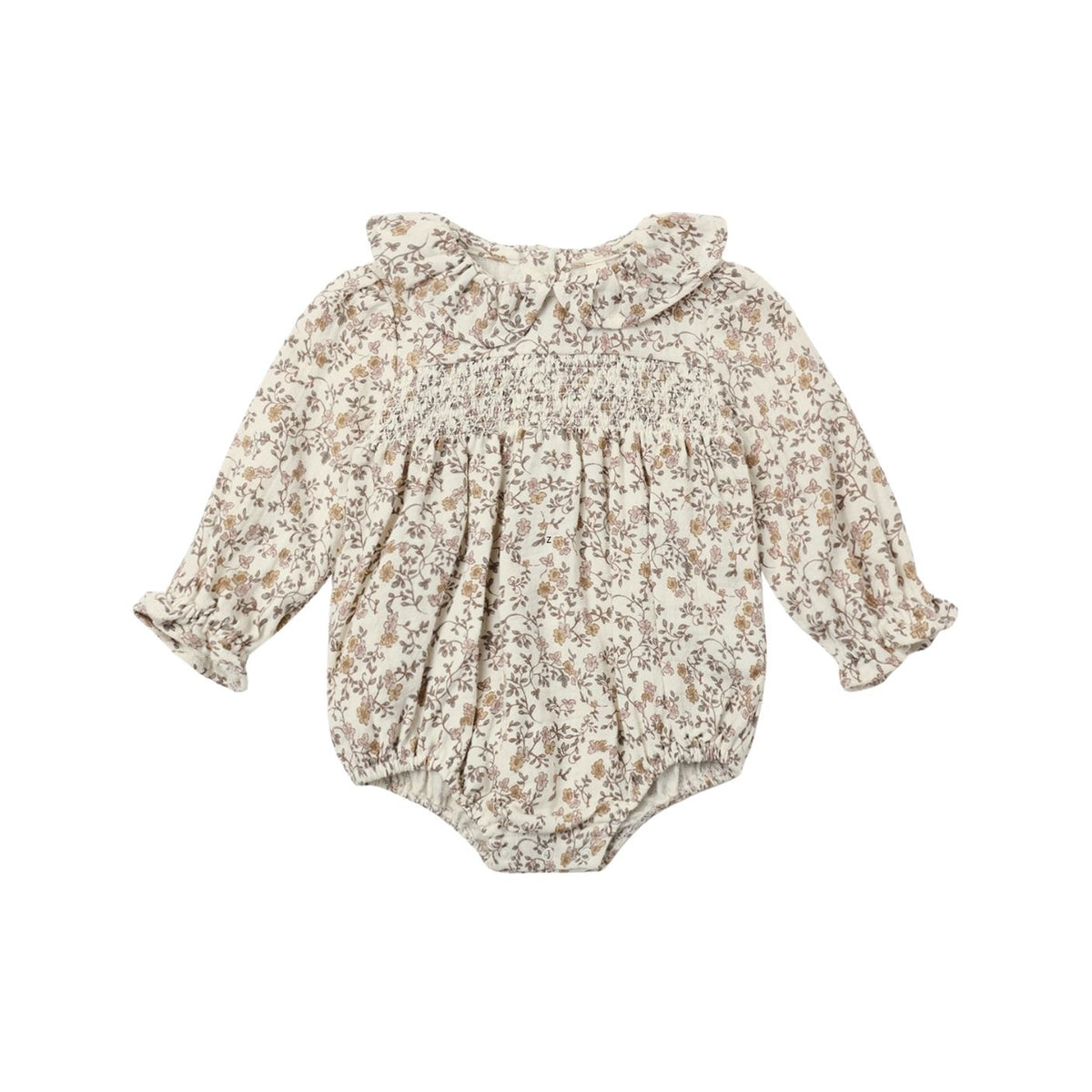 A cream-colored fabric with an intricate floral vine pattern in muted brown, dusty pink, and mustard yellow.