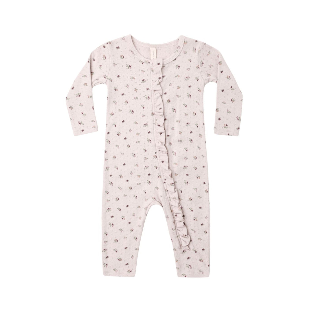 A baby long-sleeve footless romper in a pale blush pink color, featuring a delicate all-over floral print and a ruffle detail down the front center, shown against a plain white background.