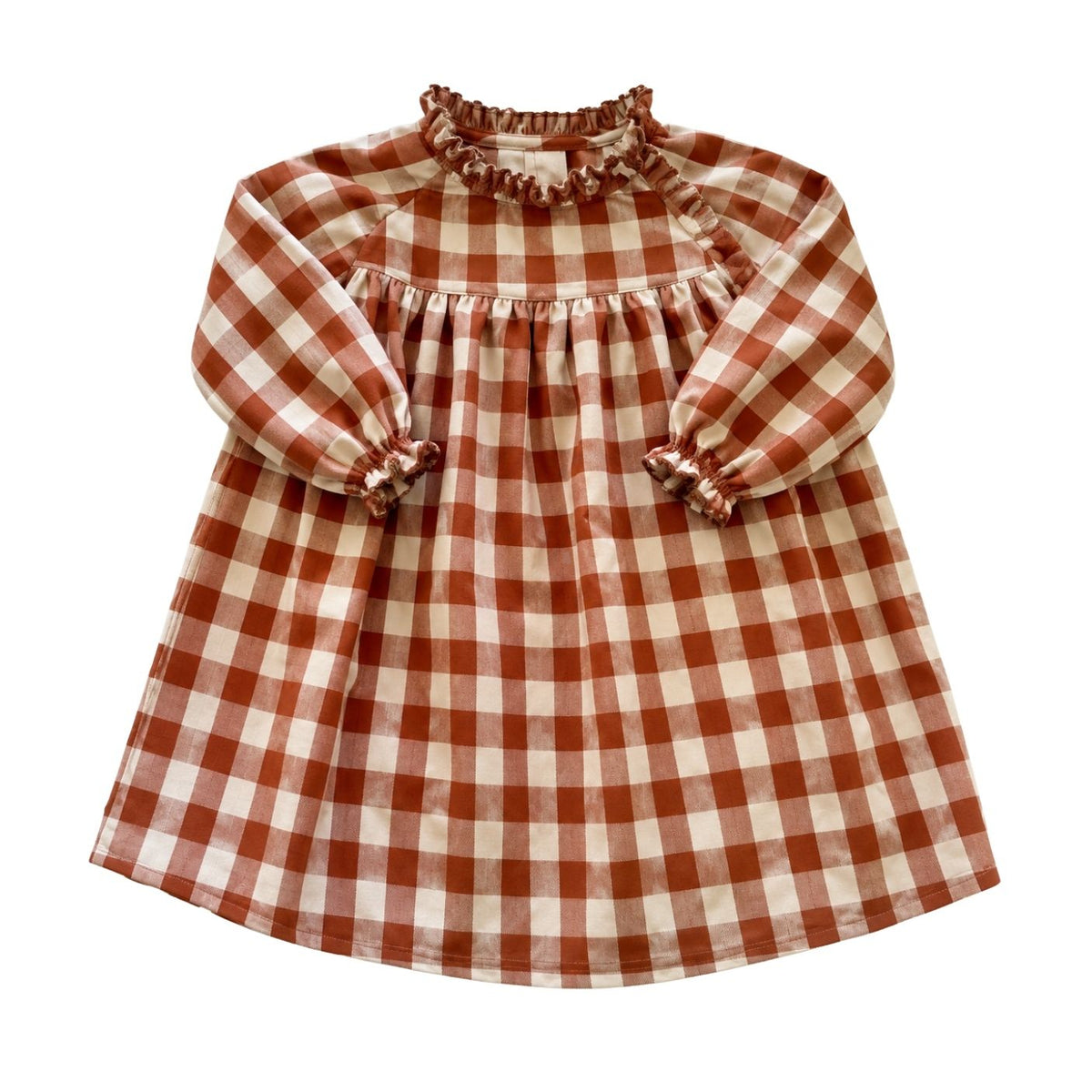 A long-sleeve baby dress with a brown and cream gingham check pattern, featuring a ruffled mock neck and elasticized cuffs, shown flat on a white background.