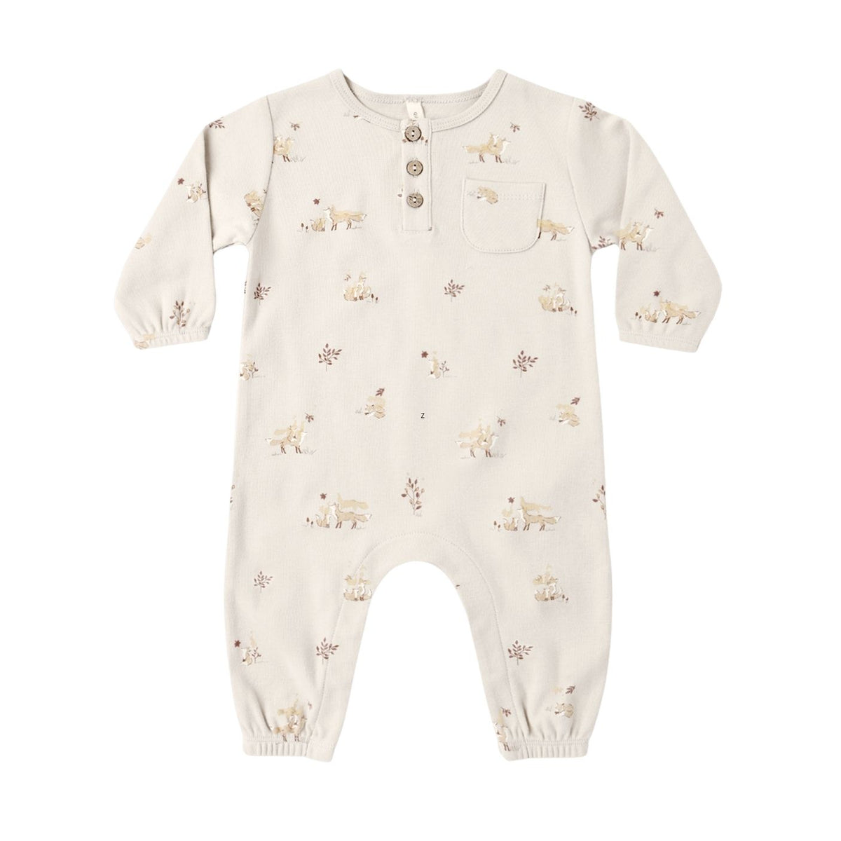 A baby long-sleeve romper in cream with a small beige and brown animal print, featuring a three-button henley neckline and a chest pocket.