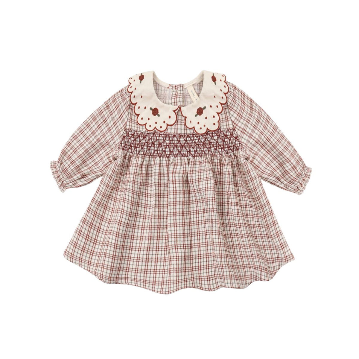 Quincy Mae long-sleeve baby dress in a red and white Christmas plaid pattern, featuring a scalloped white collar with delicate embroidery, a smocked front bodice, and ruffle trim.
