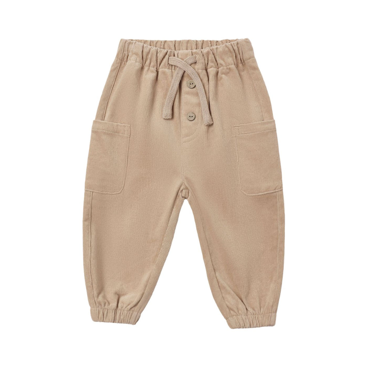 Front view of the Quincy Mae Luca Pant in Latte, showing beige corduroy pants with an elastic waistband, an adjustable drawstring with decorative buttons, side patch pockets, and elastic leg openings on a white background.