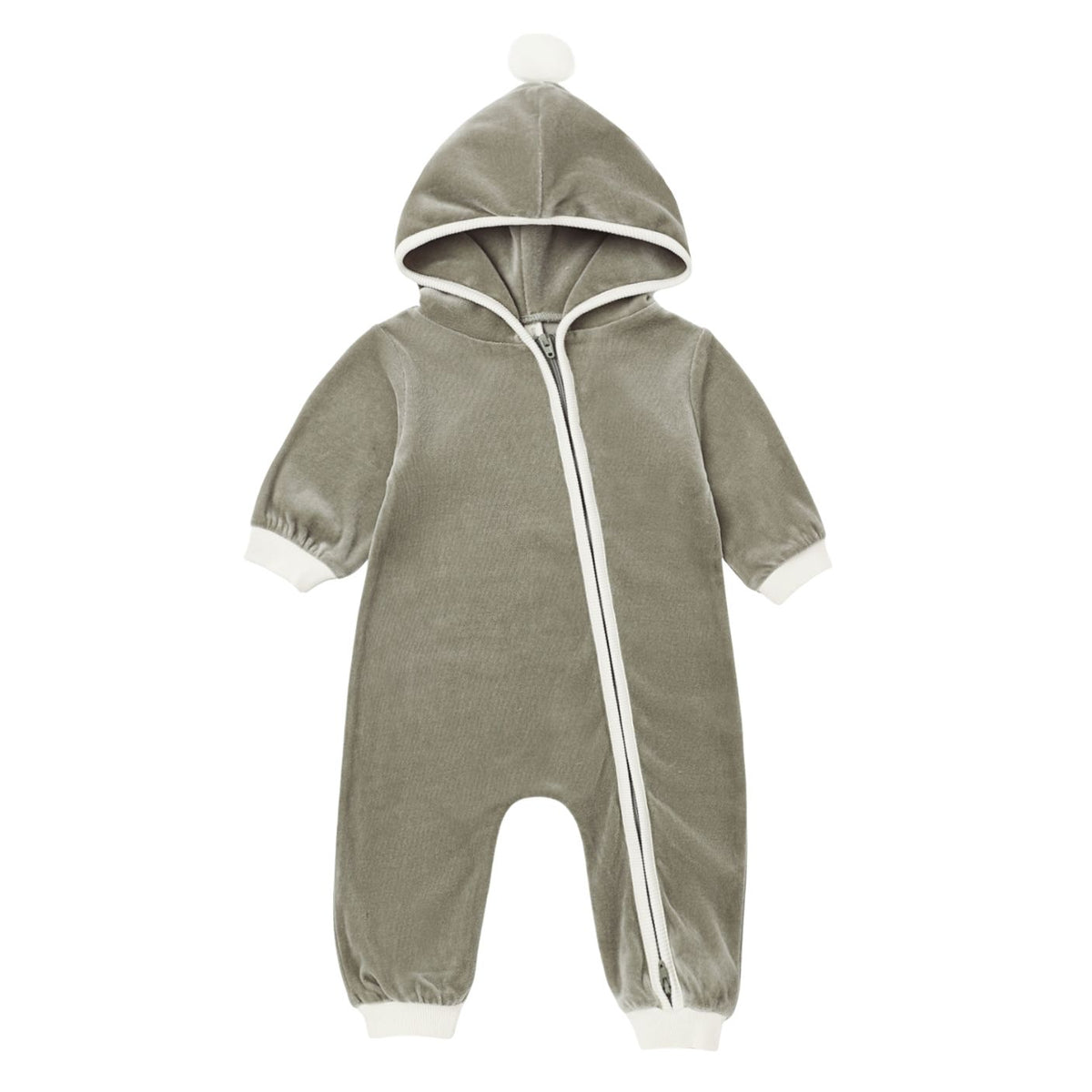 Front view of a long-sleeve hooded fleece baby jumpsuit in a rich spruce green shade, featuring a diagonal front zipper, white ribbed cuffs at the wrists and ankles, and a hood topped with a small white pom-pom against a white background.