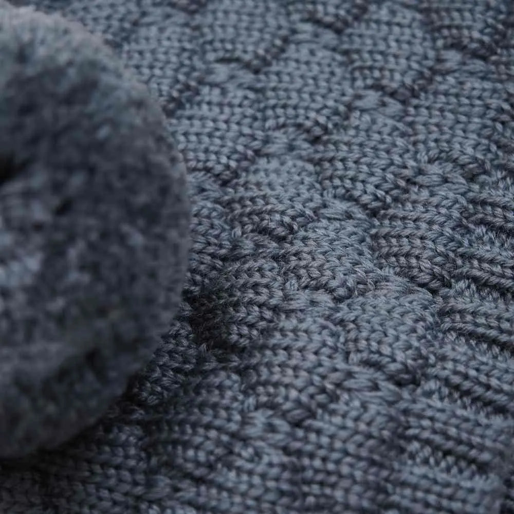 Close-up of textured blue fabric with a pattern