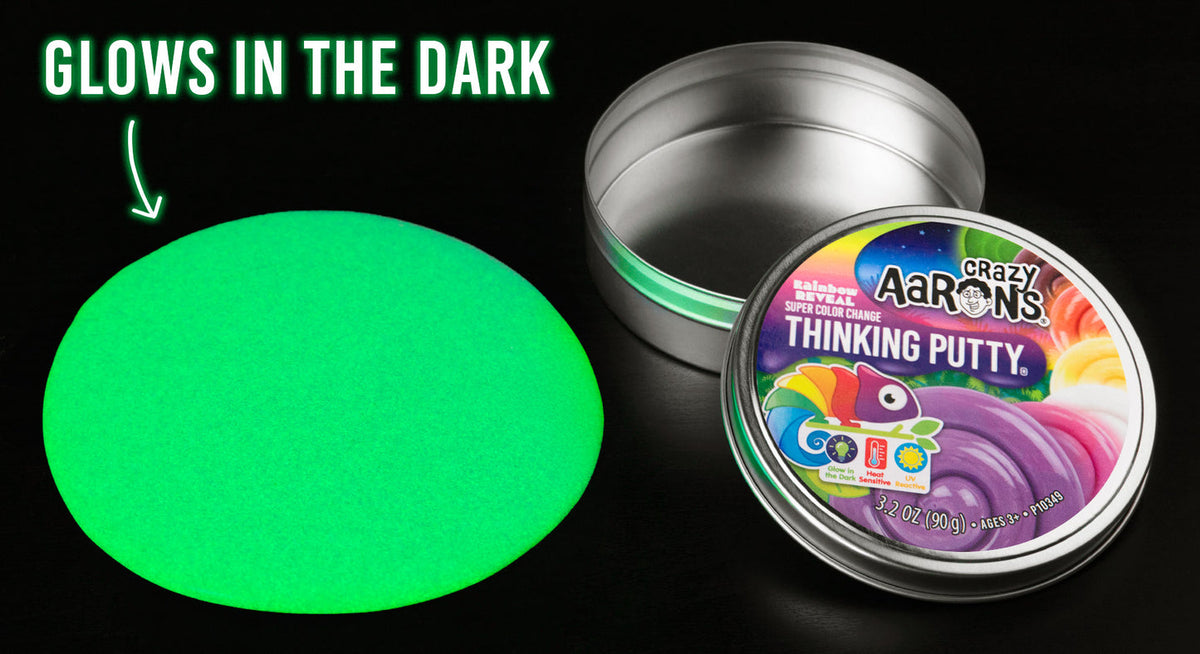 Crazy Aaron's Thinking Putty with a glowing green putty sample on a black background